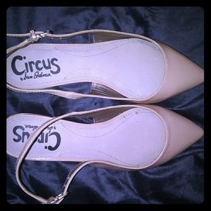 Cream colored flat shoes